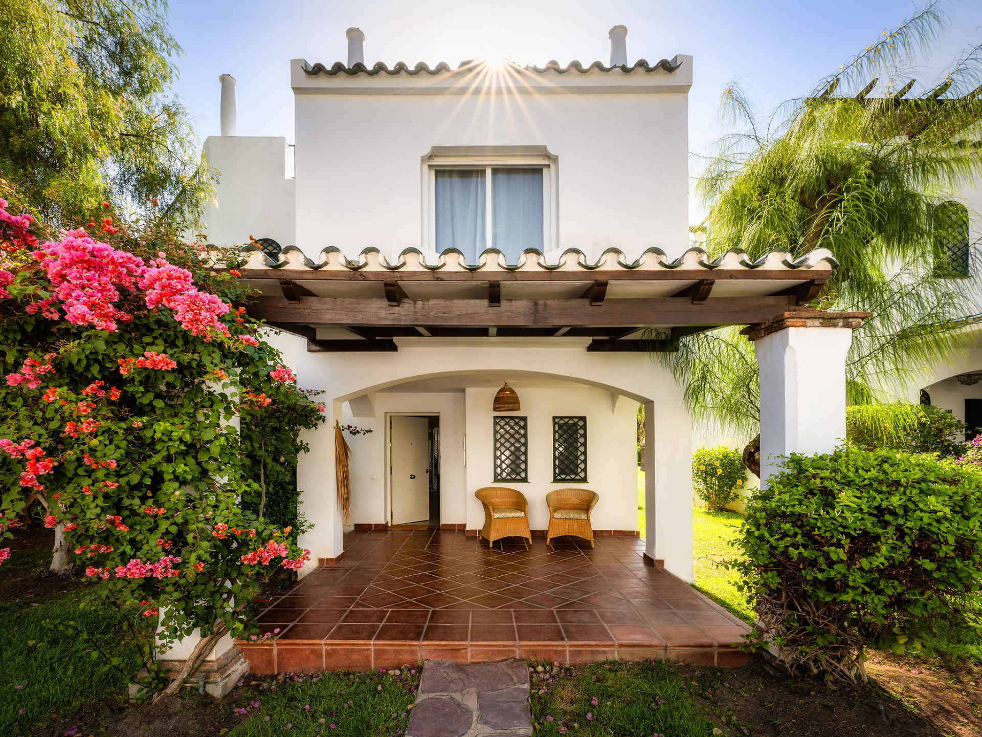 White Andalusian townhouse with bougainvillea at Soleuropa Golf